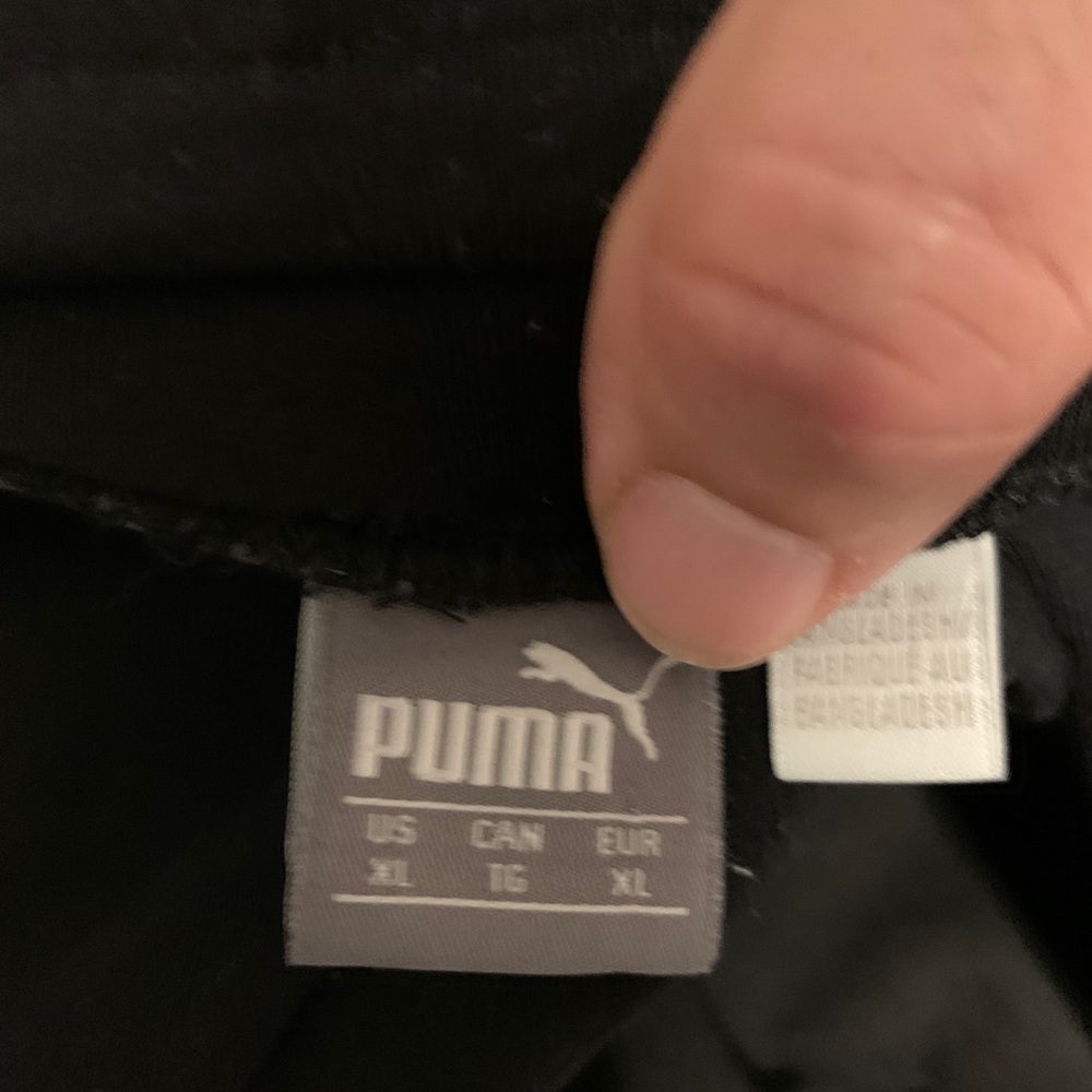 Puma women’s size XL black and gold leggings